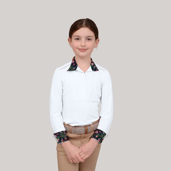 A girl in a white Chestnut Bay SkyCool Liberty show shirt with a floral collar