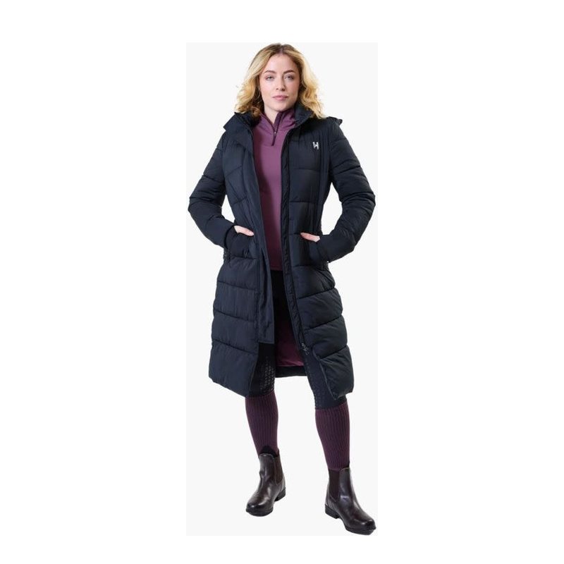 Horseware Women's Verve Long Padded Coat in black, worn with riding boots