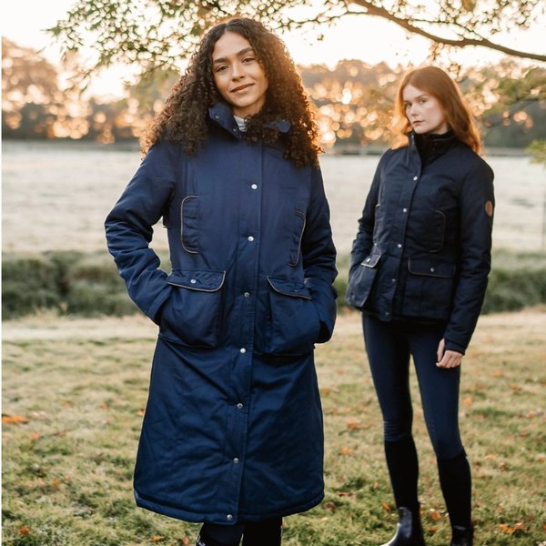 Two women in winter riding jackets