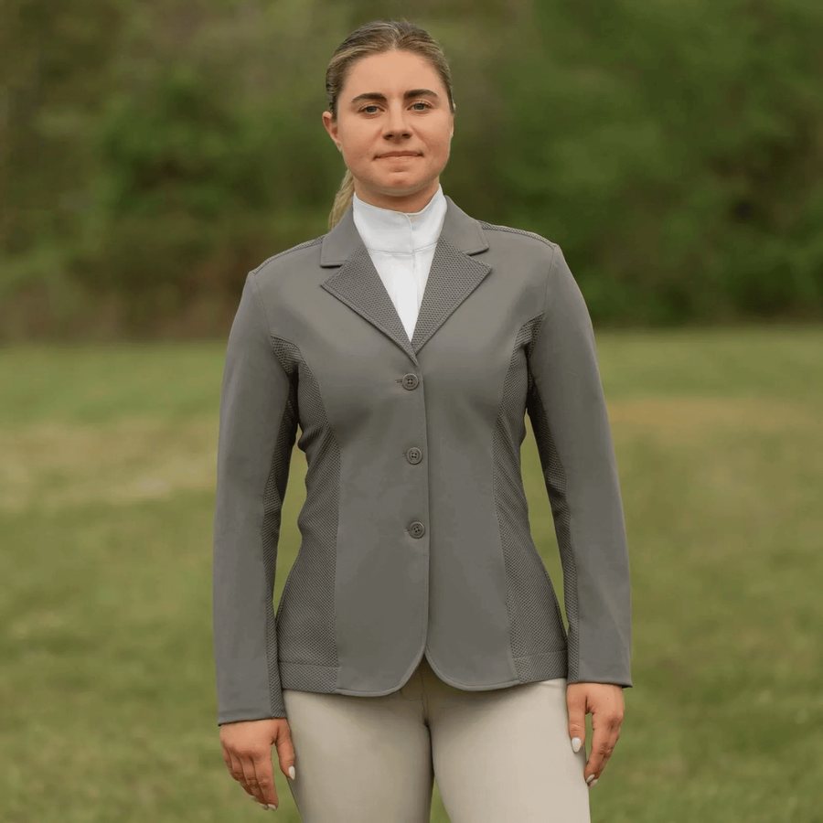 A rider in a gray Equinavia Eva NordicAir show coat
